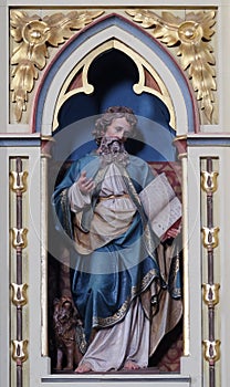 St. Mark the Evangelist statue on the pulpit in the church of Saint Matthew in Stitar, Croatia