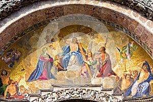 St Mark`s Basilica close-up, Venice, Italy. It is top landmark in Venice. Beautiful luxury mosaic portal, image of Christ and