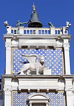 St Mark`s Clock tower on Piazza San Marco, Lion of Saint Mark ,Venice, Italy