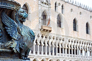 St Mark`s Square or Piazza San Marco, Venice, Italy. Detail with bronze sculpture of winged lion, symbol of Venice