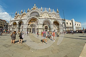 St. Mark Square, VENICE, ITALY - August 02, 2019: Basilica and Museum San Marco Locals and tourists strolling along the historical