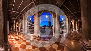 St. Marks Square Through the Arches of the Museo Correr in Venice, Italy photo