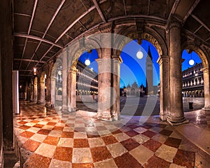 St. Marks Square Through the Arches of the Museo Correr in Venice, Italy photo