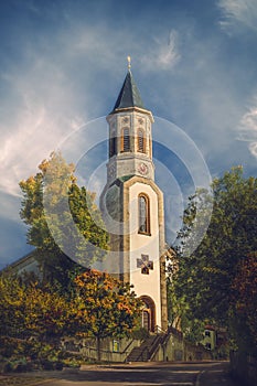 St. Martin`s Church Martinskirche in SÃÂ¶hnstetten, near Heidenheim an der Brenz, Germany on a sunny autumn day. Warm morning photo