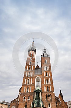 St. Mary`s basilica in main square of Krakow. Poland`s historic center, a city with ancient architecture. Cracow, Poland