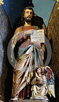 St. Matthew the Evangelist statue on the main altar in the church of Saint Matthew in Stitar, Croatia