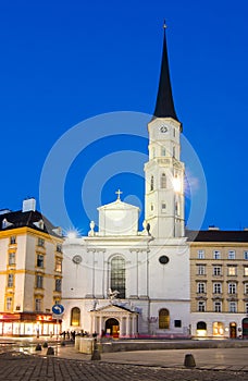 St. Michael church on Michaelplatz square at night, Vienna, Austria