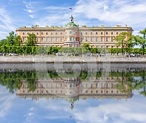 St. Michael`s Castle Mikhailovsky Castle or Engineers` Castle reflected in Fontanka river, Saint Petersburg, Russia