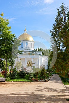 St. Michael`s Cathedral in Pskov-Pechory Monastery in Pechory, Pskov region, Russia under blue sky