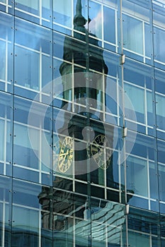 St. Michael\'s Church reflected in modern office building in Hamburg