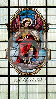 St Michael - stained glass window in the church of the Visitation in Skoky village