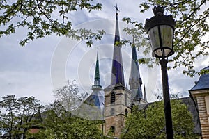 St Michael& x27;s Church towers and streetlamp, Luxembourg