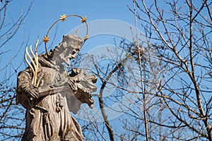 St. Nepomuk statue with blue sky