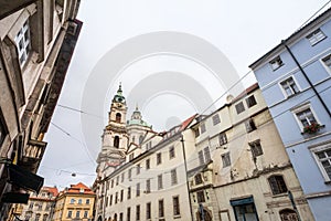 St Nicholas Church, also called Kostel Svateho Mikulase, in Prague, Czech Republic, with its dome seen from Karmelitska street