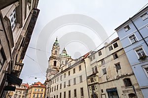 St Nicholas Church, also called Kostel Svateho Mikulase, in Prague, Czech Republic, with its dome seen from Karmelitska street