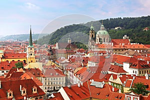 St Nicholas Church dome above red roof tops of Mala Strana, Prague Czech Republic