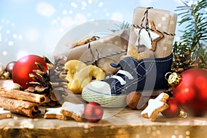St. Nicholas Day, Children`s shoe with sweets, gifts and christm