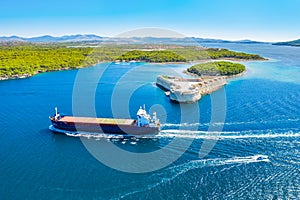 St. Nicholas fortress at Sibenik bay entrance, archipelago od Dalmatia, Croatia, freighter ship