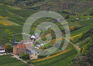 St Nicolas and Rochus church in Mayschoss in autumn from the Saffenburg in Ahr valley photo