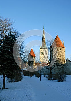 St Olaf`s Church in Tallinn, Estonia with city wall