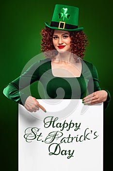 St Patrick Day. Young oktoberfest woman, wearing a dress and green hat with white banner for copy space