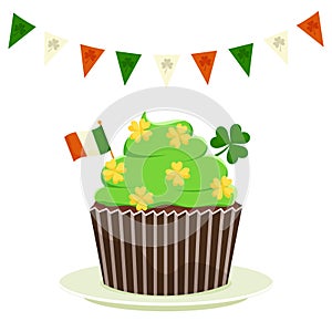 St. Patrick`s cupcake with shamrock clover and the flag of Ireland. Flat cartoon vector illustration isolated