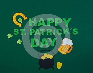 St. Patrick\'s Day. Banner design on green background with HAPPY ST. PATRICKS DAY and ornaments. Copy space