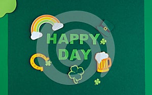 St. Patrick\'s Day. Banner design on green background with HAPPY ST. PATRICKS DAY and typical decorations.