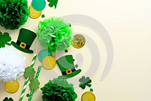 St Patrick`s Day banner design. Irish leprechauns hats, golden coins and shamrock clovers. Happy Saint Patrick`s Day. Flat lay,