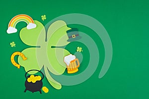 St. Patrick\'s Day. Banner design with shamrock leaf, beer, hat, pot with coins and rainbow. Copy space