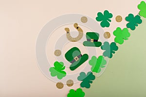 St. Patrick's Day concept with leprechaun hat, gold coins and horseshoe