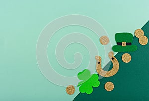 St. Patrick's Day concept with leprechaun hat, gold coins and horseshoe