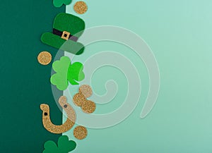 St. Patrick's Day concept with leprechaun hat, gold coins and horseshoe