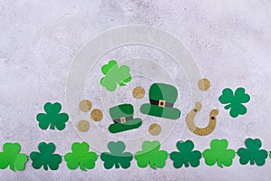 St. Patrick's Day concept with leprechaun hat, gold coins and horseshoe