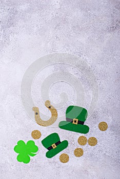 St. Patrick's Day concept with leprechaun hat, gold coins and horseshoe