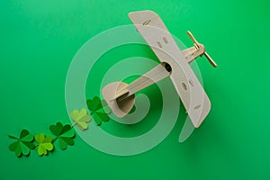 St. Patrick`s day, Plane luck Shamrock on a green background