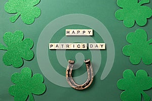 St. Patrick\'s day frame with clover leaves, horseshoe on green