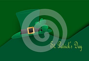 St. Patrick`s Day hat with clover on green background