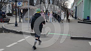 St. Patrick`s Day in Odessa. A young man in a kilt, striped socks