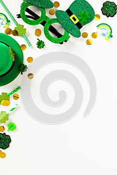 St Patrick`s Day party invitation template, poster, vertical banner mockup. Flat lay party glasses, leprechauns hat, drinking