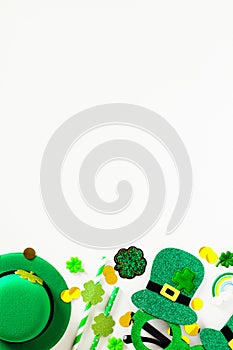 St Patrick`s Day vertical banner design, poster template, party invitation mockup. Flat lay leprechauns hat, party glasses,