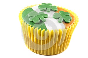 St patricks day cupcake with icing and shamrocks