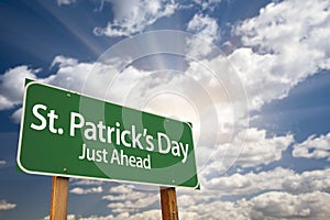 St. Patricks Day Just Ahead Green Road Sign and Clouds