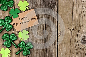 St Patricks Day tag with shramrock side border over wood