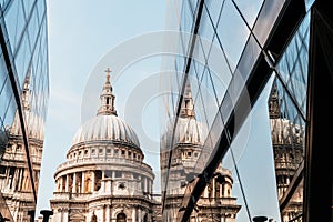 St. Paul's Cathedral church ireflected in glass walls of One New Change in London photo