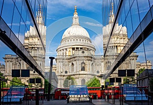 St. Paul\'s cathedral reflected in glass walls of One New Change store, London, UK photo