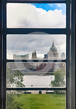 St Paul`s Cathedral seen from a Tate Modern window on a rainy day