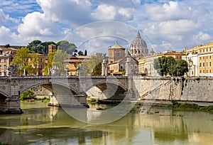 St Peter\'s basilica dome in Vatican and Victor Emmanuel II bridge over Tiber riber, Rome, Italy photo