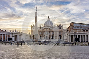 St. Peter`s basilica on St. Peter`s square in Vatican at sunset, center of Rome, Italy