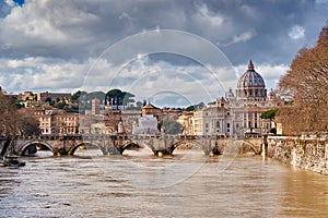 St. Peter`s cathedral and Tiber river in Rome